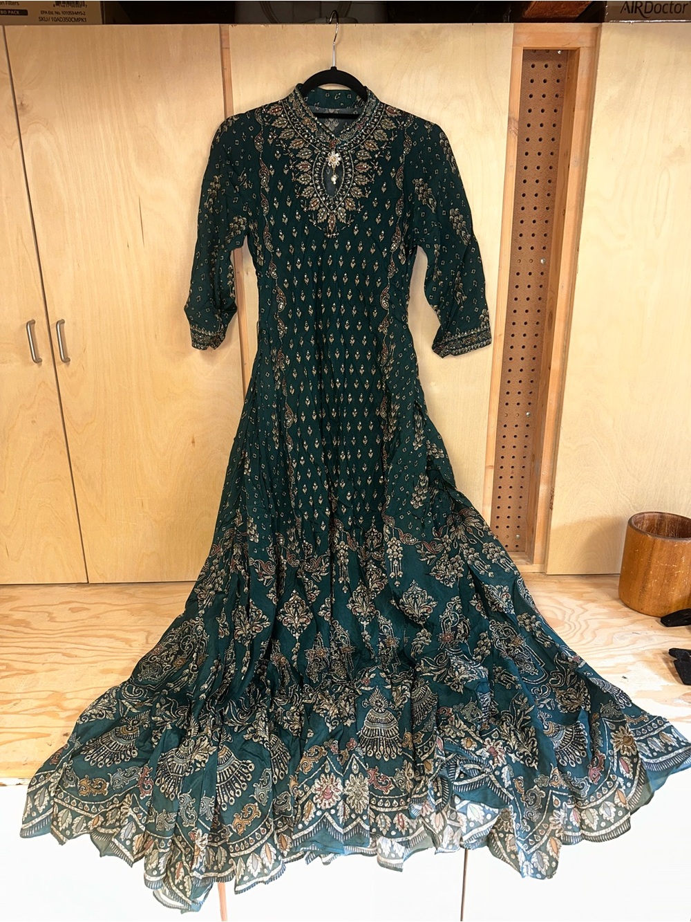 Elegant Dark Green Printed Maxi Dress with Gold Accents